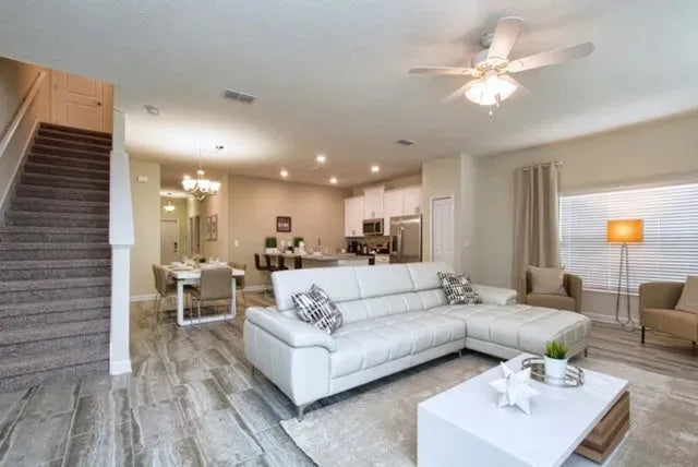 Vacation home living room with a large white sofa